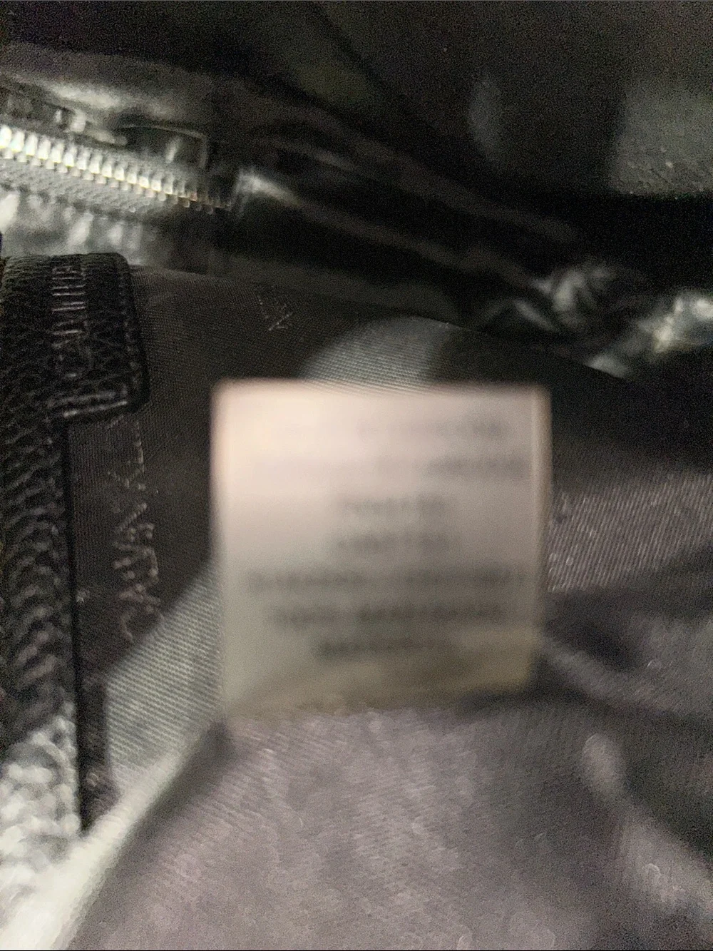 Calvin Klein Black Pebbled Leather Mini Backpack with Front Zip Pocket
